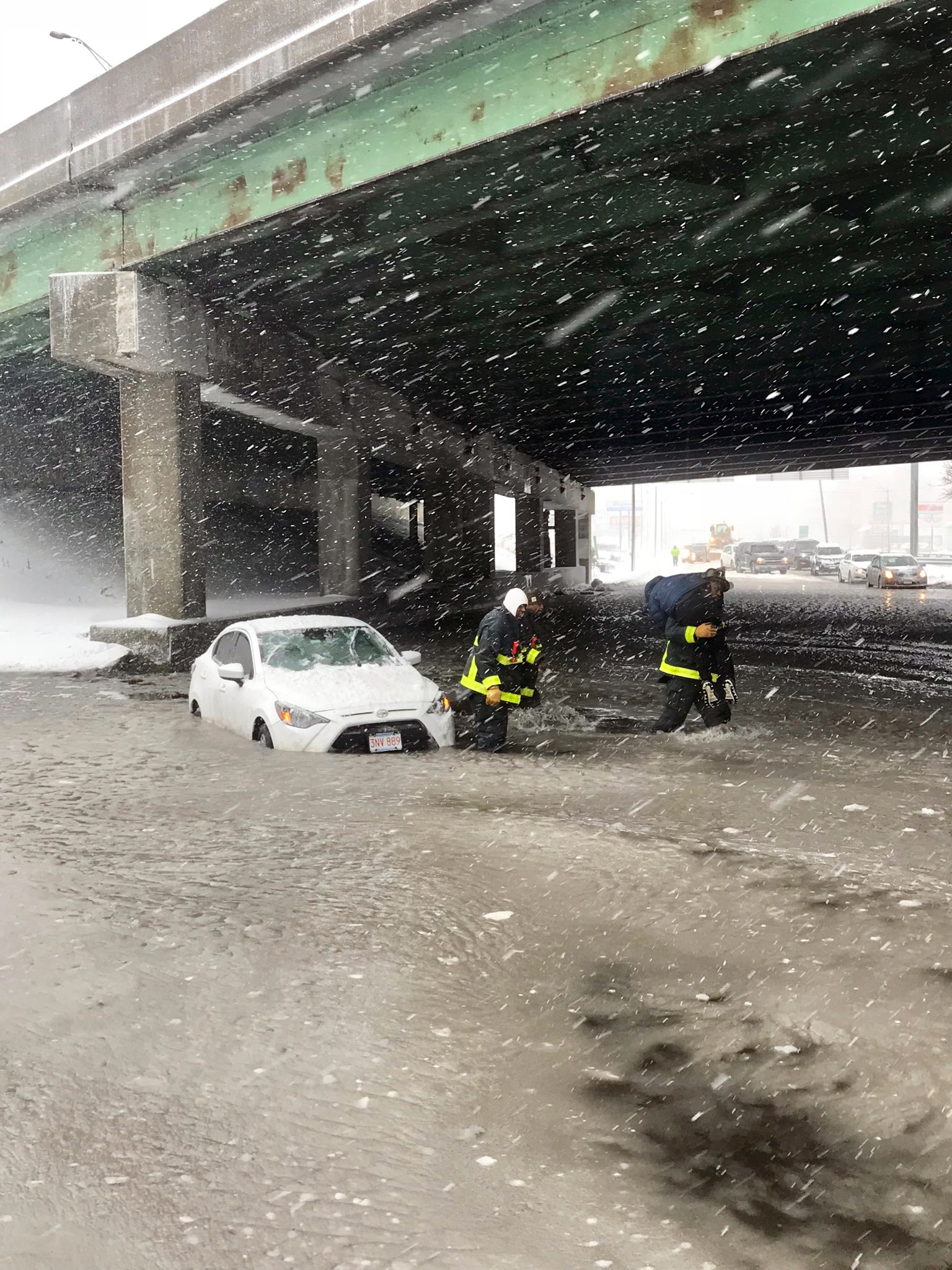 PHOTO: The Boston Fire Department shared images of Neponset Circle firefighters rescuing a driver who was trapped by rising water in Boston, Jan. 4, 2018.