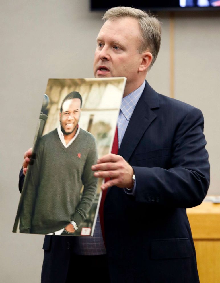 PHOTO: In this Sept. 23, 2019, file photo, assistant District Attorney Jason Hermus shows a photo of Botham Jean to the jury during his opening statement before the jury during former Dallas police Officer Amber Guyger's trial in Dallas.