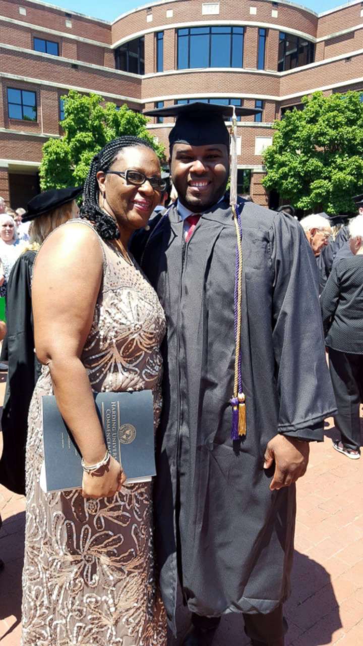 PHOTO: Allison Jean with her son, Botham, at a graduation ceremony at Harding University.
 