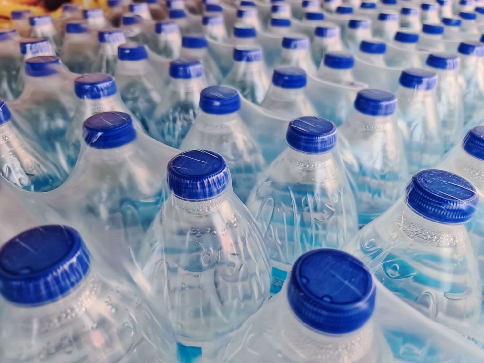 Photo: Stock image undated. A lot of bottled water with blue caps.