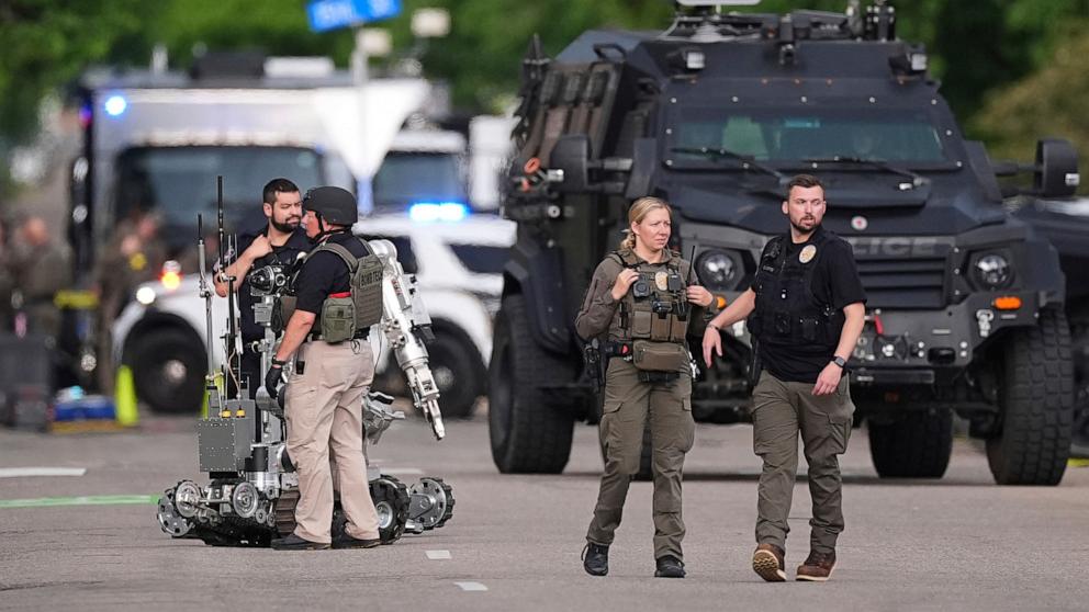 PHOTO: Law enforcement officials investigate after an attack on the Pearl Street Mall, June 1, 2025, in Boulder, Colo. 