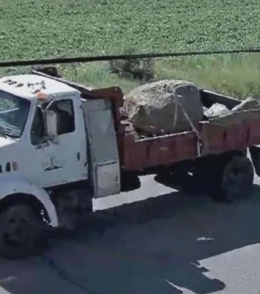 PHOTO: A mother and daughter died when a roughly 800-pound boulder fell off a truck and smashed into their car in Rosemount, Minn., July 9, 2018.