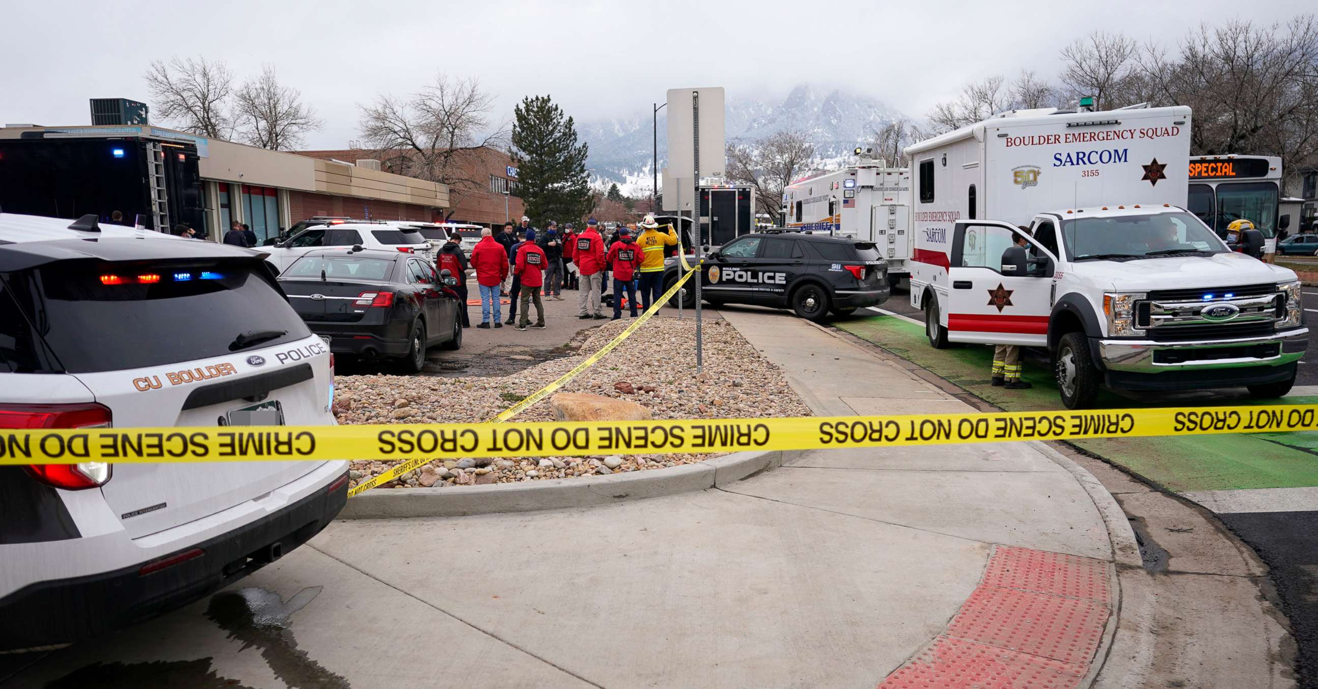 PHOTO: Police work on the scene outside a King Soopers grocery store where a shooting took place on March 22, 2021, in Boulder, Colo.