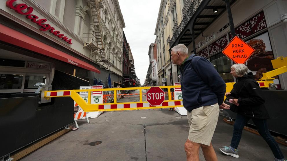 PHOTO: Newly installed security barriers are seen on Bourbon Street next to a memorial for victims of the Jan. 1 car attack ahead of the Super Bowl in New Orleans, Friday, Jan. 31, 2025. 