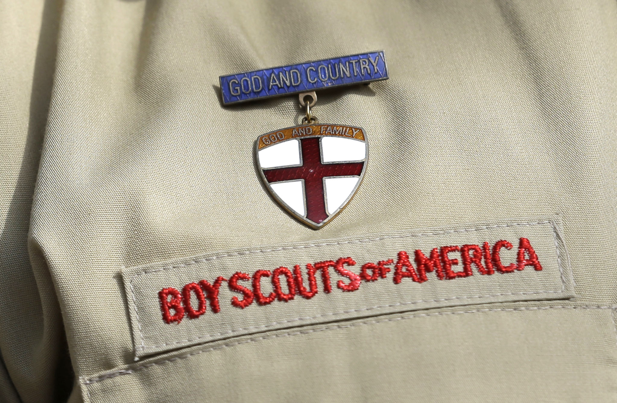 PHOTO: In this Feb. 4, 2013 file photo, a close up detail of a Boy Scout uniform is worn during a news conference in front of the Boy Scouts of America headquarters in Irving, Texas.
