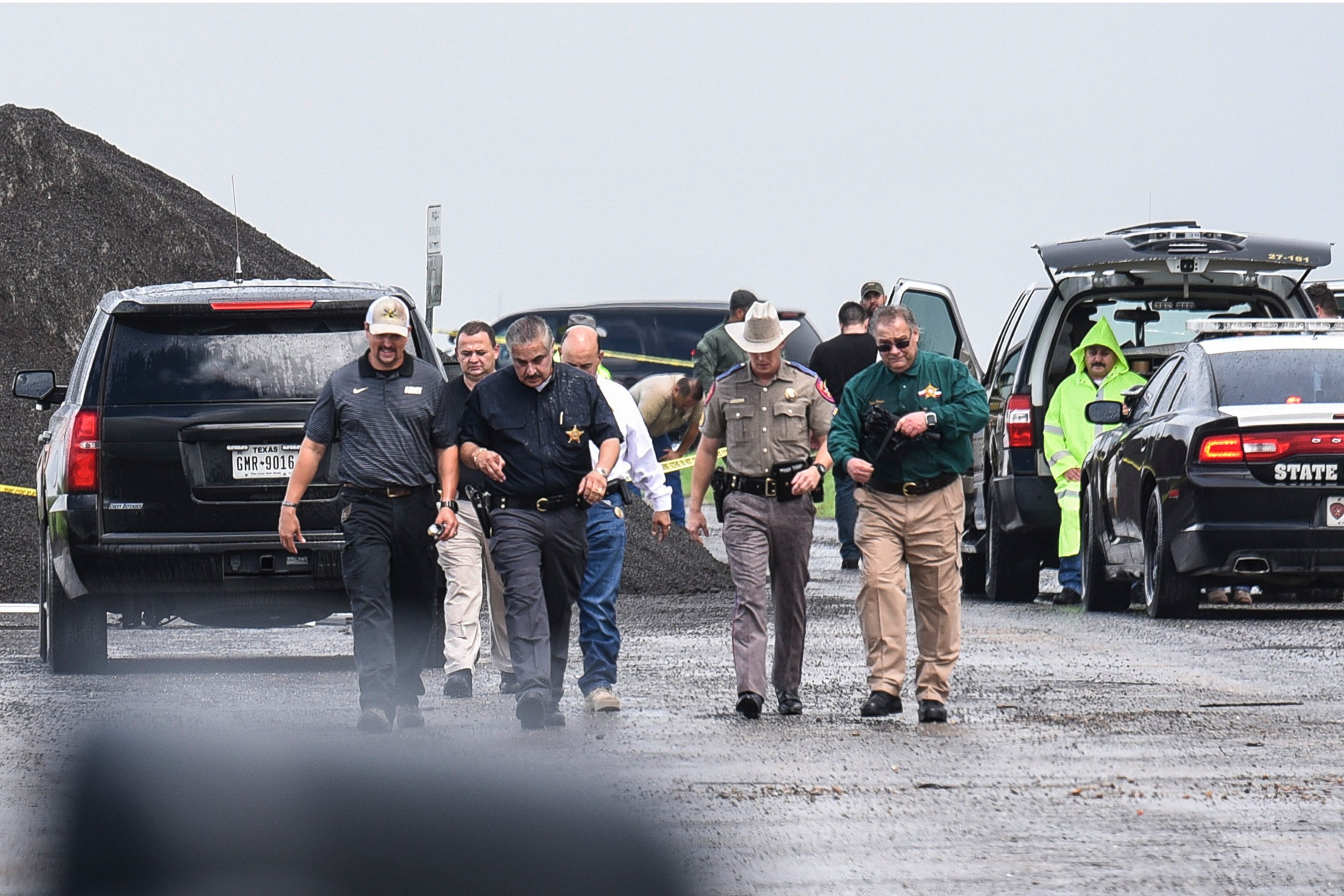 PHOTO: Law enforcement officers gather near the scene where the body of a woman was found near Interstate 35 north of Laredo, Texas on Saturday, Sept. 15, 2018.