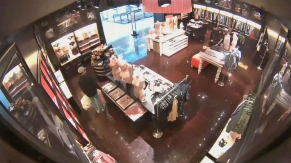 PHOTO: The suspect left the Victoria's Secret location with his white bag full of bras.