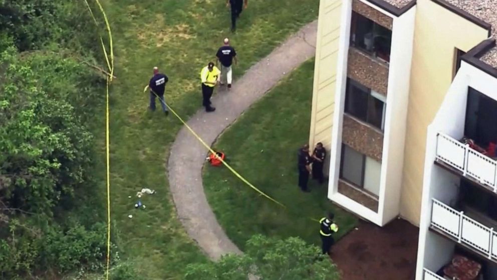 PHOTO: Officials investigate the scene where two police officers and a K9 were shot responding to a domestic call in Braintree, Mass., on June 4, 2021.