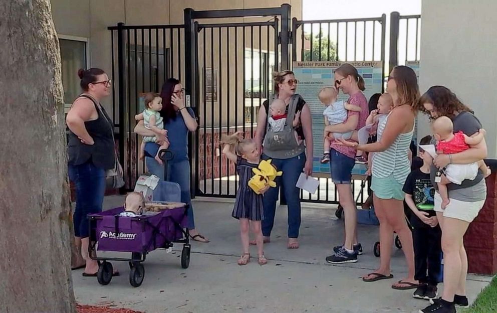 PHOTO: Breastfeeding mothers protest outside the Nessler Park Family Aquatic Center, Texas City, Texas, June 10, 2019.