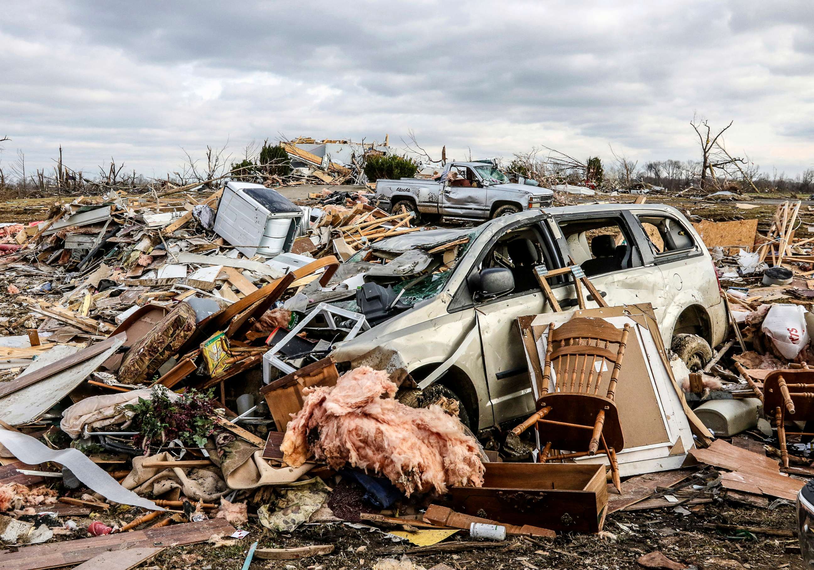 PHOTO: Damaged vehicles and personal property are strewn over a wide area,  Dec. 11, 2021, in Bremen, Ky, after a devastating tornado swept through the area overnight.