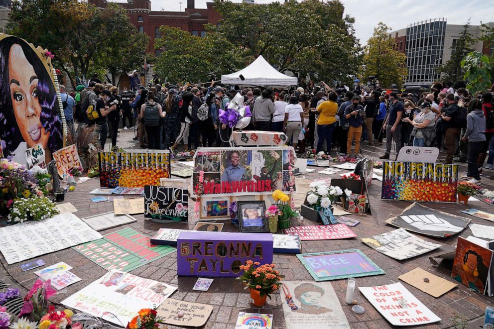 PHOTO: People gather in Jefferson Square awaiting word on charges against police officers, Sept. 23, 2020, in Louisville, Ky.