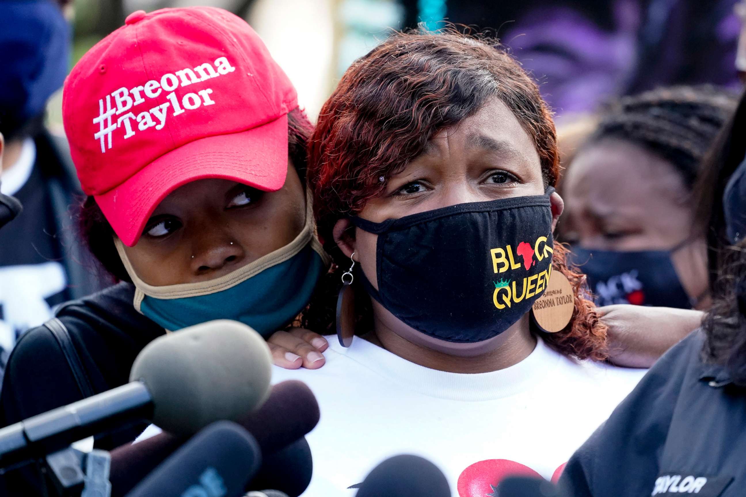 PHOTO: Tamika Palmer, the mother of Breonna Taylor, right, listens to a news conference, Sept. 25, 2020, in Louisville, Ky.
