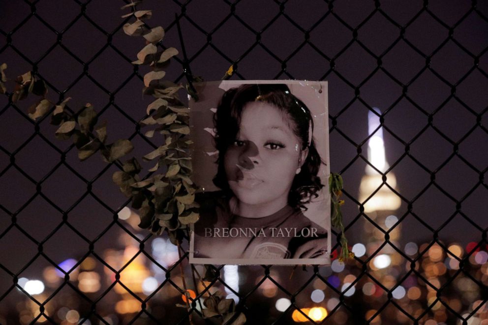 PHOTO: A picture of Breonna Taylor is seen at a makeshift memorial for victims of racial injustice, following the announcement of a single indictment in Taylor's case, in Brooklyn, N.Y., Sept. 24, 2020.