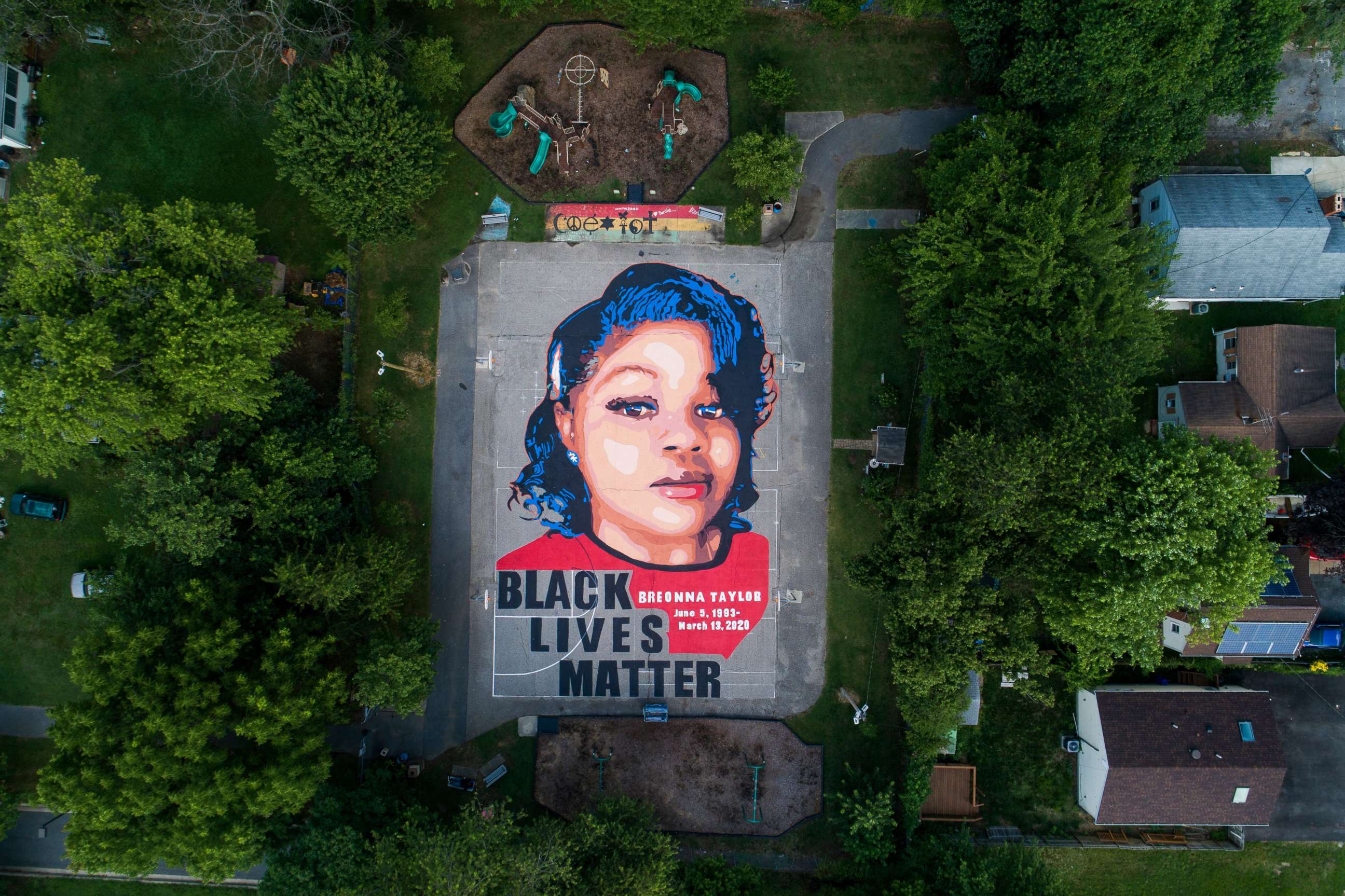 PHOTO: An image shows a mural of Breonna Taylor, who was killed in her own apartment by Louisville, Kentucky police officers, on two basketball courts in Annapolis, Maryland, July 8, 2020.