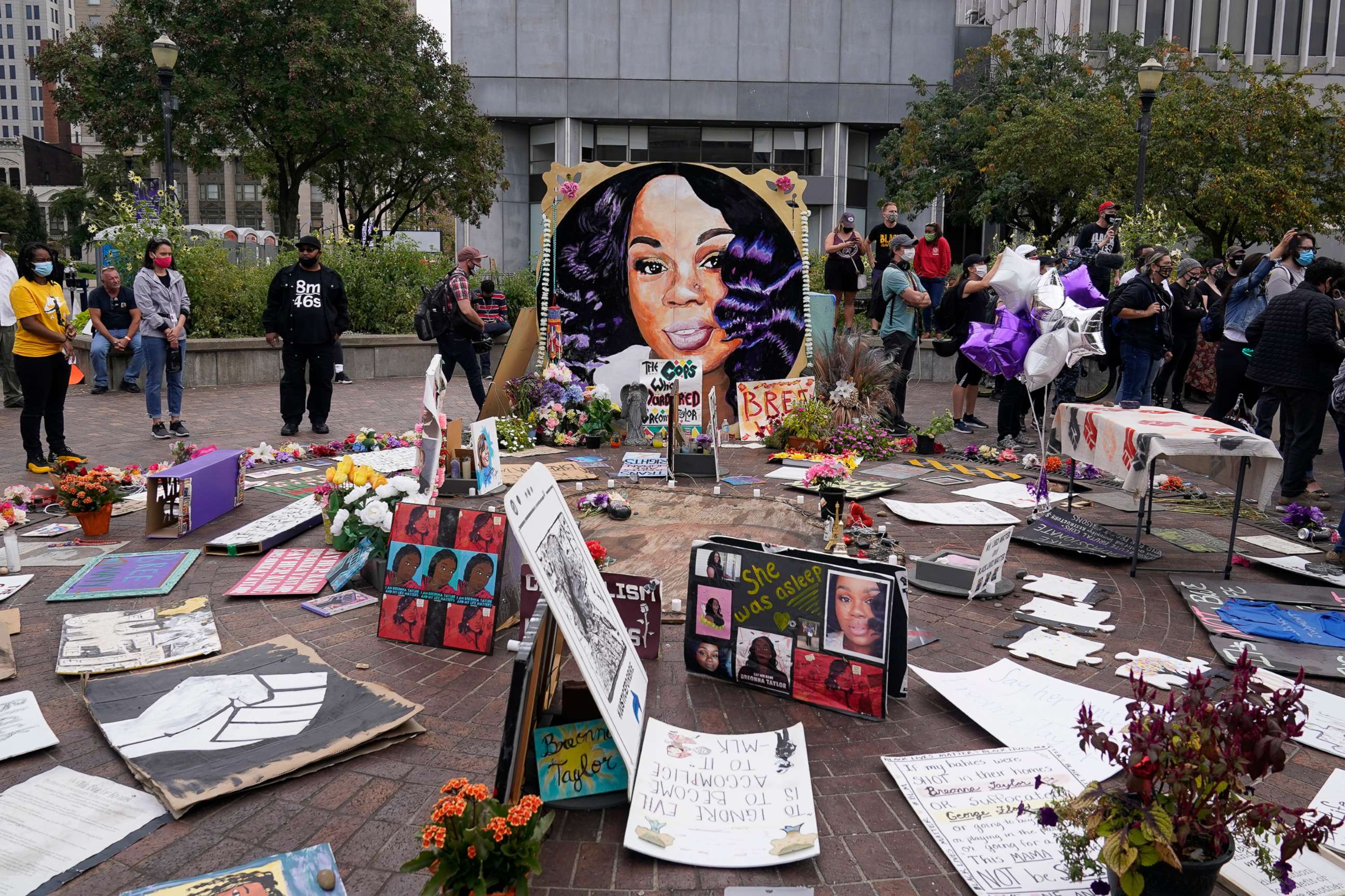 PHOTO: People gather in Jefferson Square awaiting word on charges against police officers, Sept. 23, 2020, in Louisville, Ky.