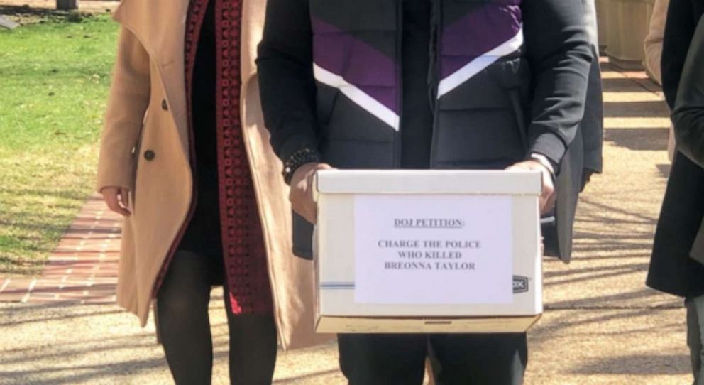 PHOTO: A box of 18,000 signatures calling for charges against the officers involved in Breonna Taylor's death is delivered to the Department of Justice on March 14, 2022.