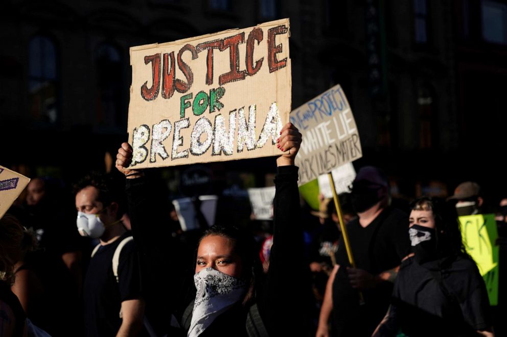 PHOTO: People march in the streets during a protest against the deaths of Breonna Taylor by Louisville police and George Floyd by Minneapolis police, in Louisville, Kentucky, May 29, 2020.