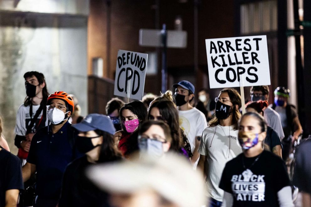 PHOTO: Protesters carried signs in support of arresting the cops that killed Breonna Taylor, Sept. 23, 2020, in Chicago.