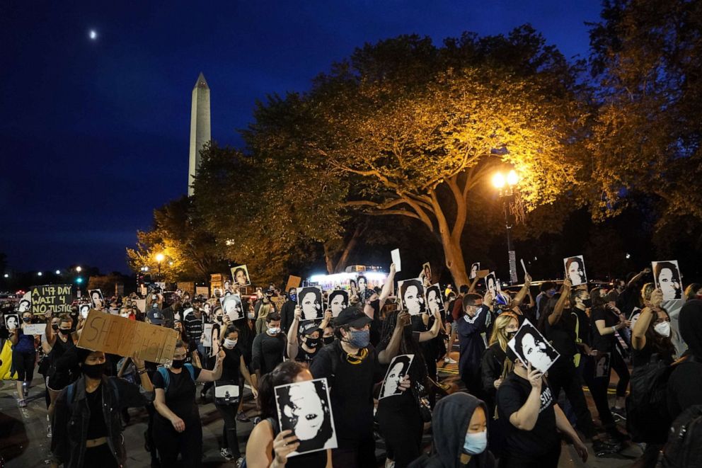 PHOTO: Demonstrators march near the White House in protest following a Kentucky grand jury decision in the Breonna Taylor case, Sept. 23, 2020, in Washington, DC.