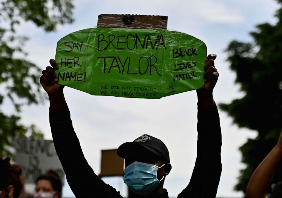 PHOTO: Protesters hold up signs on June 3, 2020, during a "Breonna Taylor and Black Lives Matter" protest in New York City, after the recent death in Minneapolis police custody of George Floyd.