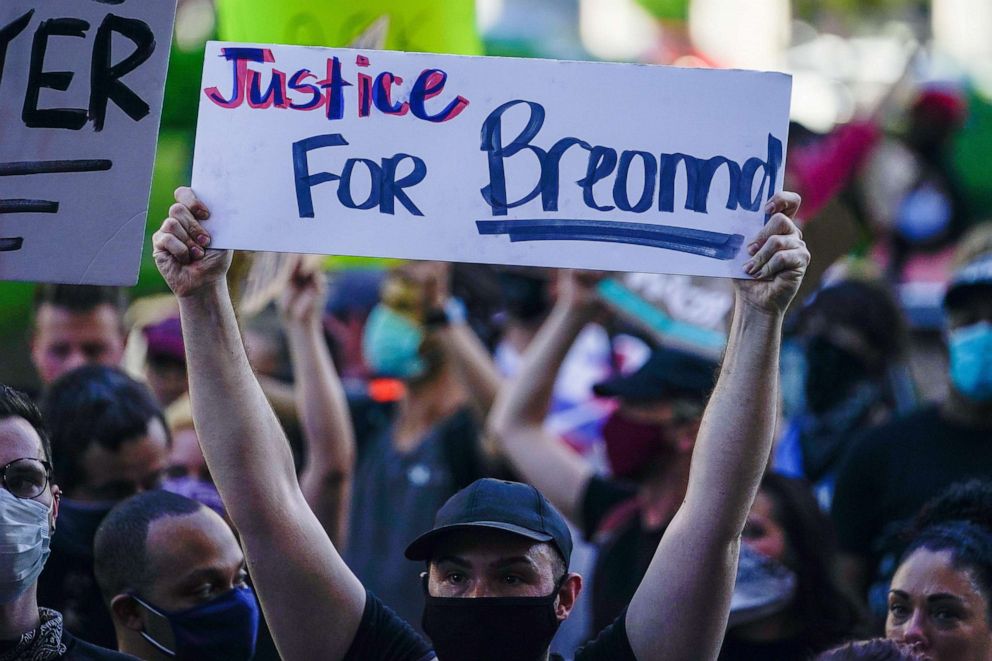 PHOTO: People gather in the street during a protest against the deaths of Breonna Taylor by Louisville police and George Floyd by Minneapolis police, in Louisville, Kentucky, May 29, 2020.