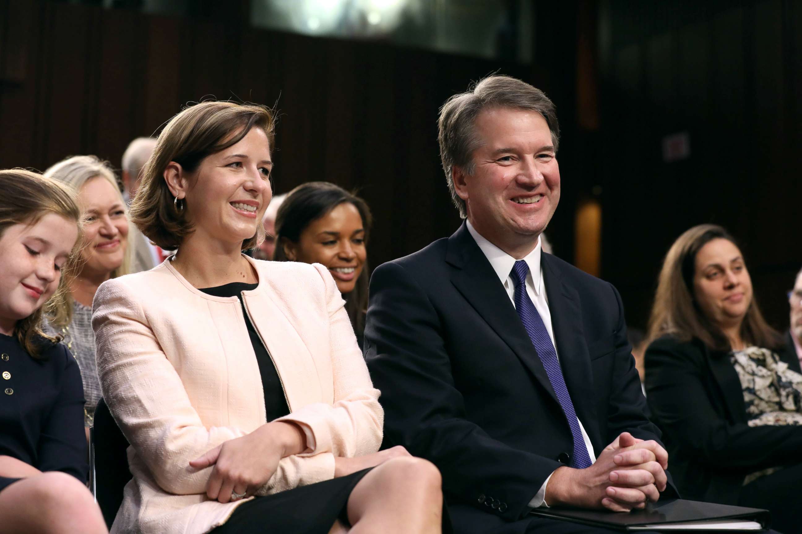 PHOTO: Supreme Court nominee judge Brett Kavanaugh sits with his wife Ashley Estes Kavanaugh as they listen to his introductions at his Senate Judiciary Committee confirmation hearing on Capitol Hill in Washington, Sept. 4, 2018.