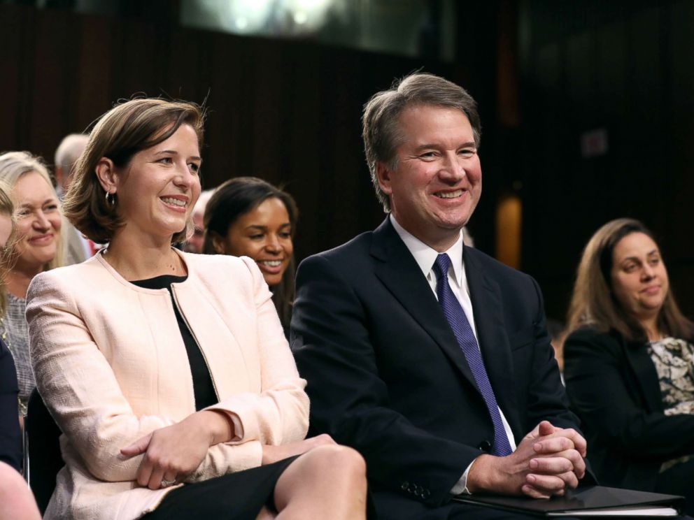 PHOTO: Supreme Court nominee judge Brett Kavanaugh sits with his wife Ashley Estes Kavanaugh as they listen to his introductions at his Senate Judiciary Committee confirmation hearing on Capitol Hill in Washington, Sept. 4, 2018.