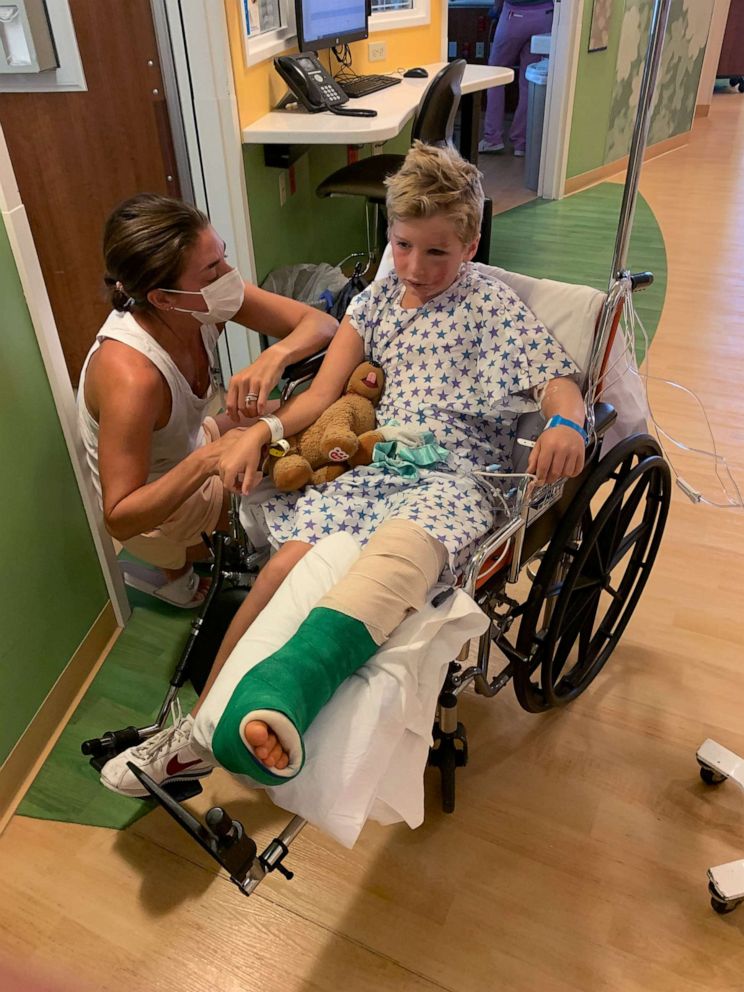 PHOTO: Erin Brewer with her son, George, in the Ann & Robert H. Lurie Children's Hospital of Chicago in an undated photo following his fall from a climbing wall at Navy Pier in Chicago. 