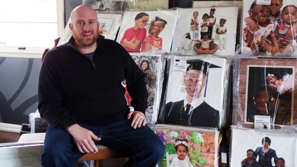 PHOTO: Brian Bononi of Kansas City, Missouri, is trying to connect families with photos that were abandoned in an image shop after it closed.