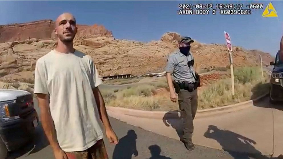 PHOTO: This Aug. 12, 2021, photo from video shows Brian Laundrie talking to a police officer after police pulled over the van he was traveling in with his girlfriend, Gabby Petito, near the entrance to Arches National Park in Utah.