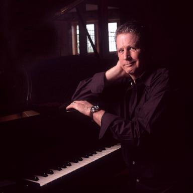 PHOTO: Brian Wilson sits at a piano in his home, St Charles, Illinois, July 12, 1998. 