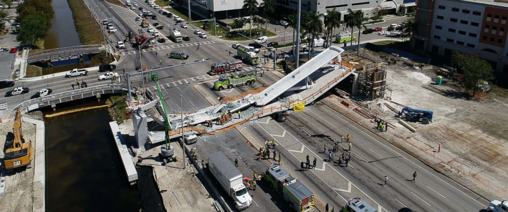 PHOTO: This photo provided by DroneBase shows the collapsed pedestrian bridge at Florida International University in Miami, March 15, 2018. 