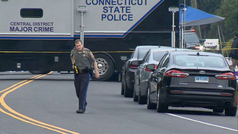 PHOTO: Law enforcement at the scene in Bristol, Conn., Oct. 13, 2022, after two officers were shot and killed while responding to a domestic call.