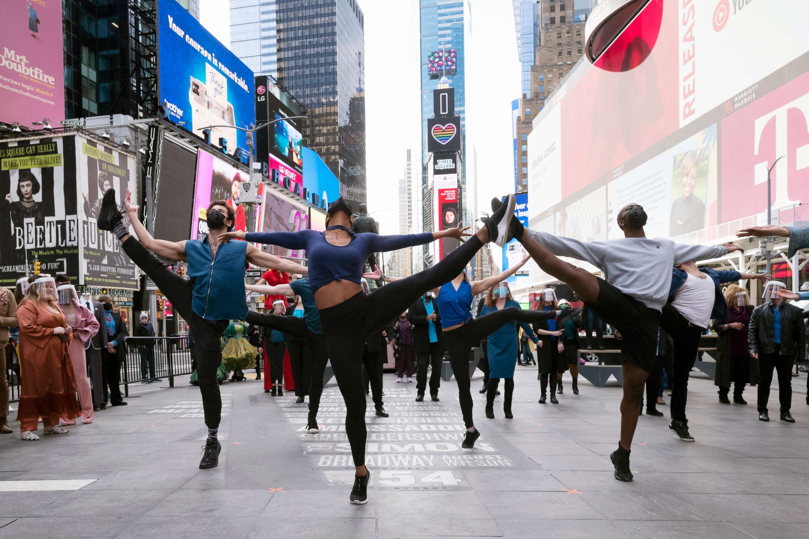 PHOTO: Dancers from Broadway shows perform in New York's Times Square, March 12, 2021.