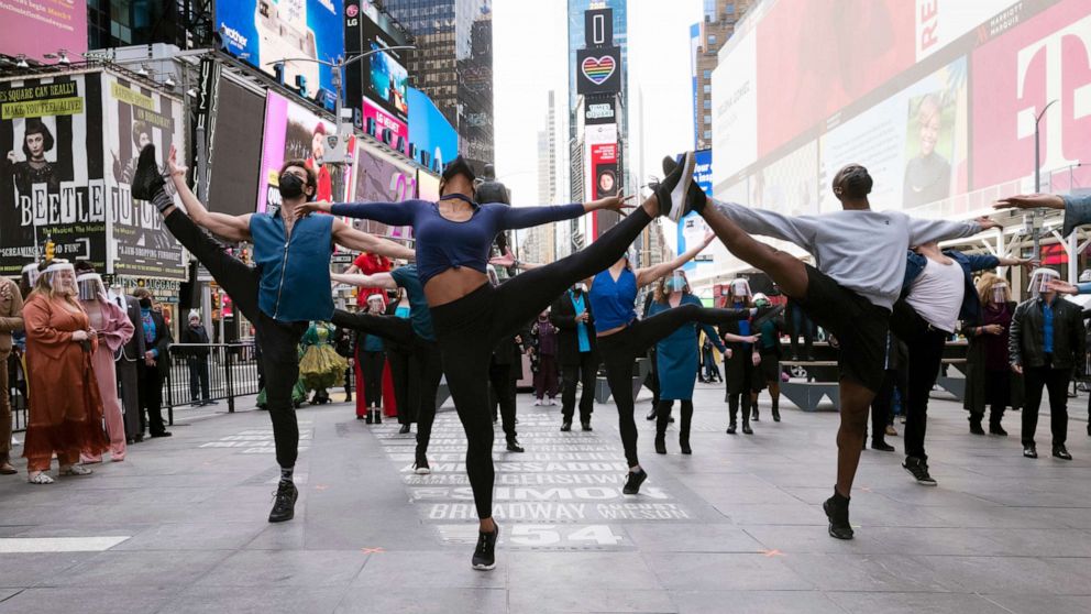PHOTO: Dancers from Broadway shows perform in New York's Times Square, March 12, 2021.
