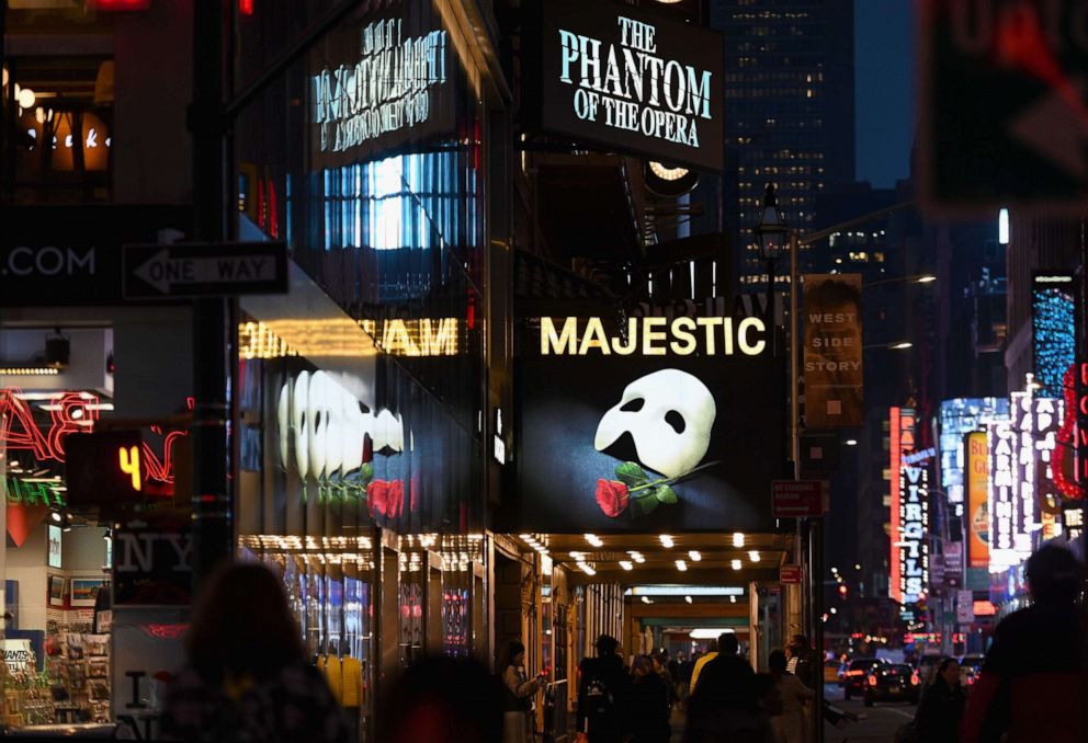 PHOTO: Signage of the Broadway play "The Phantom of the Opera" is seen at Times Square in New York City on March 12, 2020.