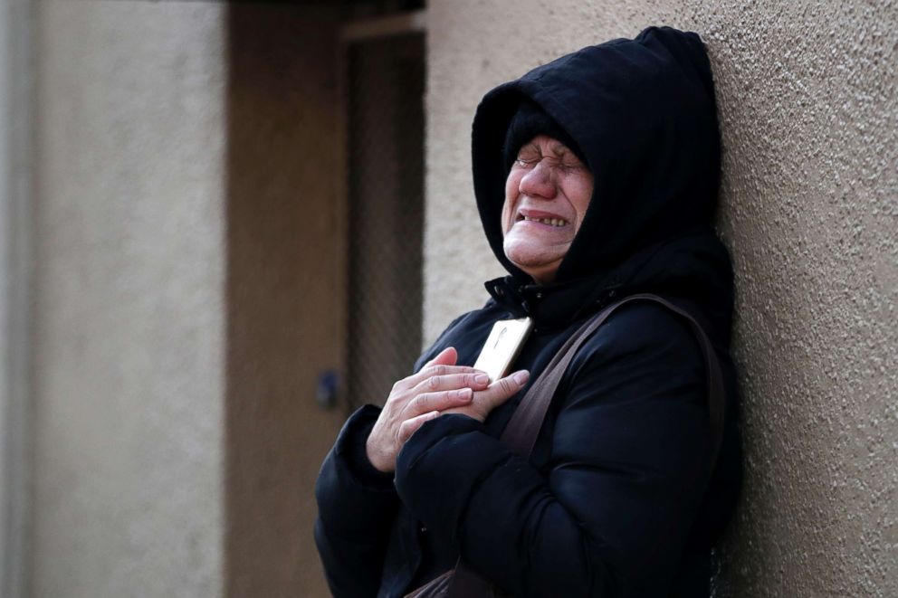 PHOTO: Nilda Guerrero, a friend of the superintendent of an apartment apartment building where at least 12 people died in a fire in the Bronx borough of New York, cries after trying to visit the building, Dec. 29, 2017. 