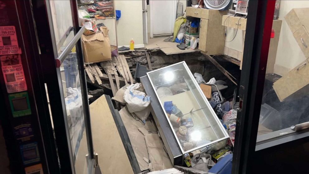 PHOTO: Debris lies at the scene of a floor collapse at New Klaman Hair Braiding store in the Bronx borough of New York, Dec. 5, 2021.