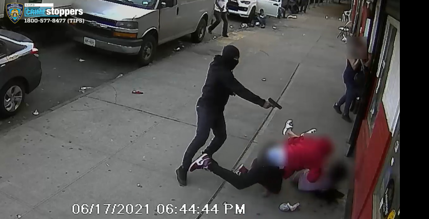 PHOTO: In a video released by the NYPD, a gunman opens fire on a victim in close proximity to two young children in the Bronx borough of New York, June 17, 2021.