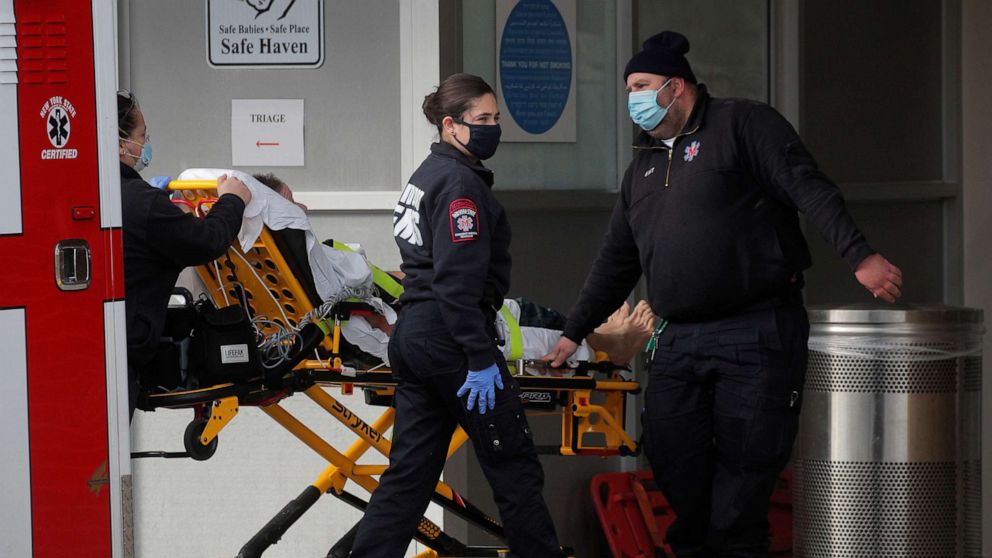 PHOTO: A patient arrives outside Maimonides Medical Center, as the spread of COVID-19 continues, in Brooklyn, New York, Dec. 4, 2020.