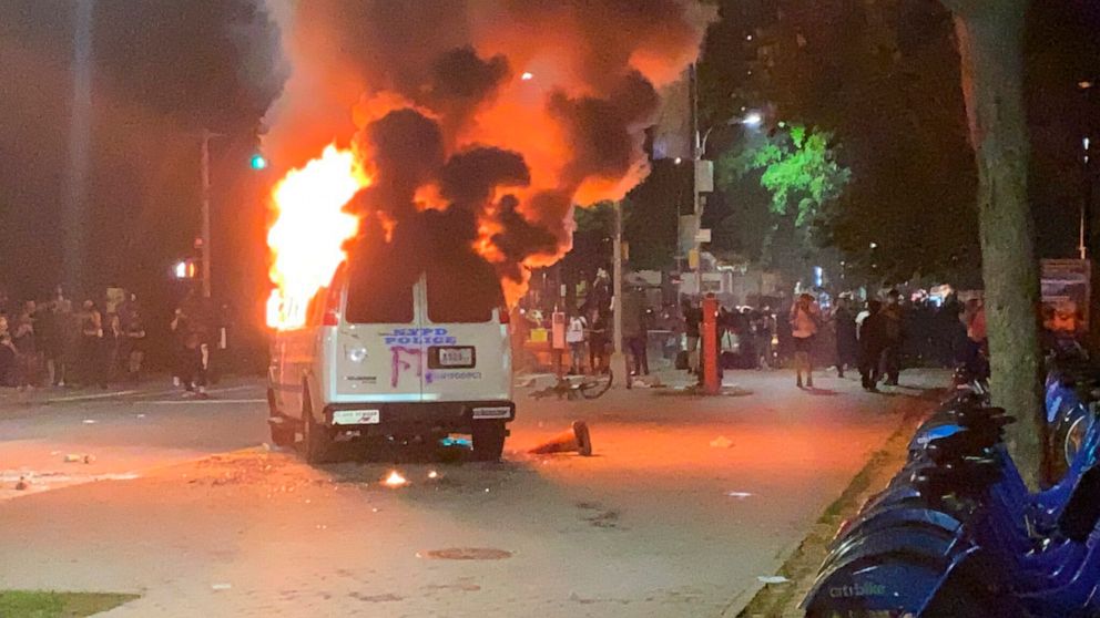 PHOTO: In this photo provided by Khadijah, flames erupt from a New York City Police Department van set ablaze, Friday, May 29, 2020, in the Brooklyn borough of New York, during a protest of the death of George Floyd in police custody in Minneapolis.