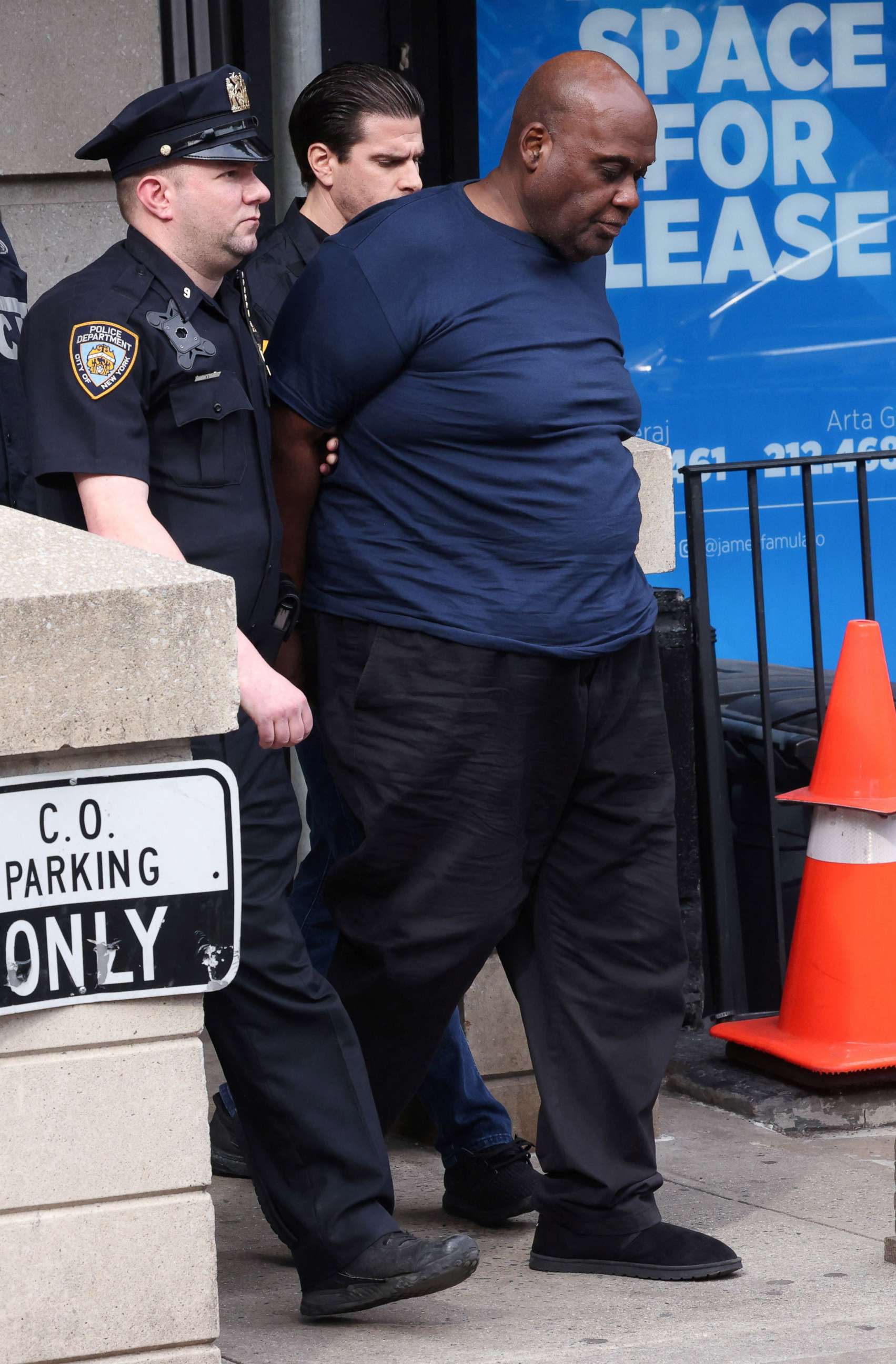 PHOTO: Frank James, the suspect in the Brooklyn subway shooting, is escorted from an NYPD precinct in Manhattan, New York, April 13, 2022. 