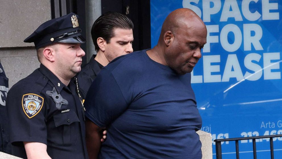 PHOTO: Frank James, the suspect in the Brooklyn subway shooting, is escorted from an NYPD precinct in Manhattan, New York, April 13, 2022. 