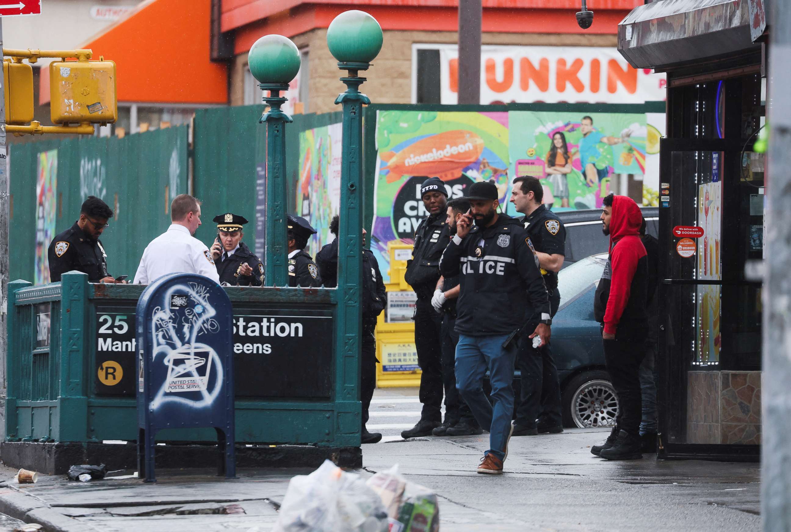 PHOTO: Police officers work at the scene of a shooting at a subway station in the Brooklyn borough of New York City, April 12, 2022.