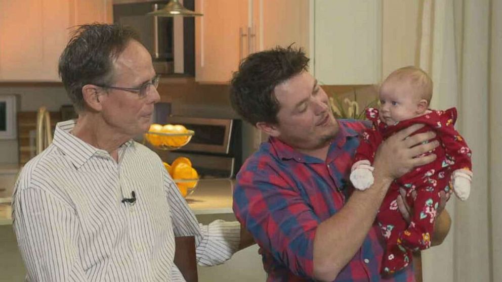PHOTO: Fiance Shane Carey, along with his father, holds he and Heidi Broussard's baby, Margot Carey, during an interview with ABC News on Wednesday, Jan. 8, 2020. Authorities believe Broussard's friend, Magen Fieramusca, killed her and took the child.