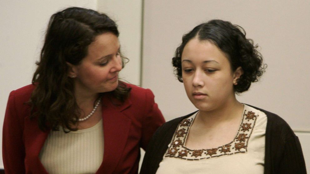  Wendy Tucker rubs Cyntoia Brown's back during closing arguments in her trial in Nashville, Tenn. Brown received a life sentence for the murder of Johnny Mitchell Allen, Aug. 25, 2006. 