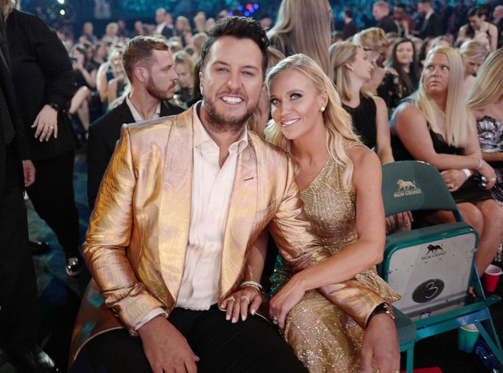PHOTO: Luke Bryan and Caroline Boyer pose in the audience during the 54th Academy Of Country Music Awards at MGM Grand Garden Arena, April 7, 2019.