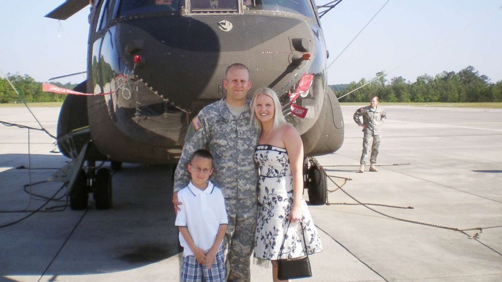 Army Chief Warrant Officer Bryan Nichols poses for a photo with his family in an undated handout photo.