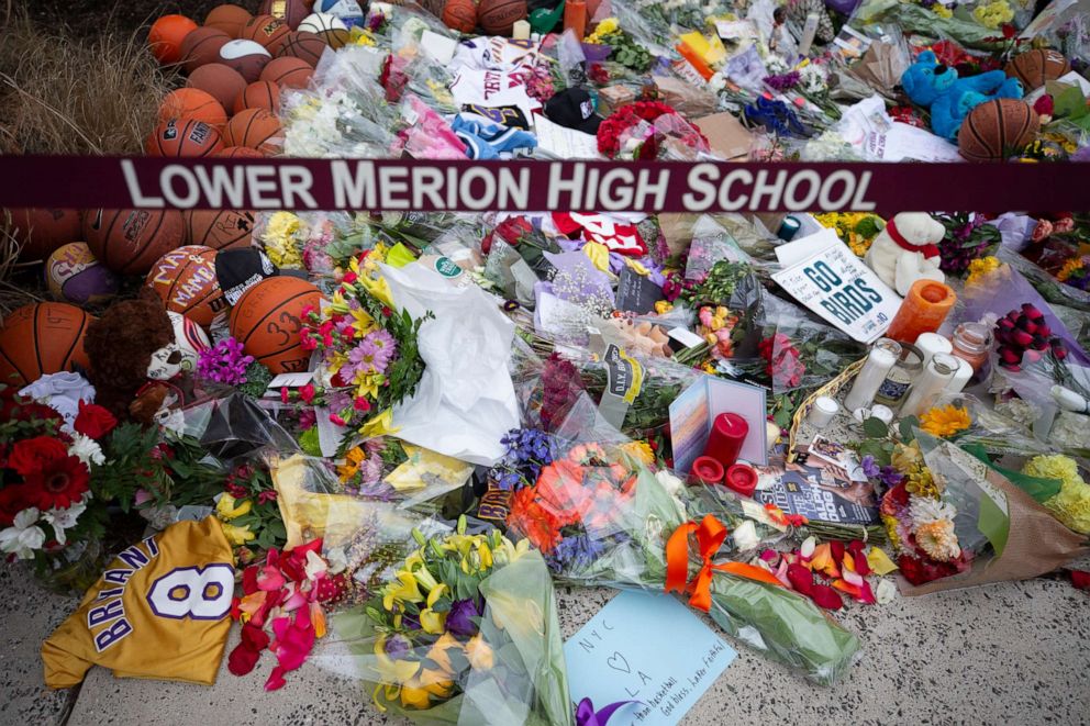 PHOTO: Basketballs, flowers, letters, and jerseys are left at a memorial for former Los Angeles Laker Kobe Bryant in this Jan. 27, 2020 photo, at Lower Merion High School in Ardmore, Pa., after Bryant, a former student, was killed in a helicopter crash.