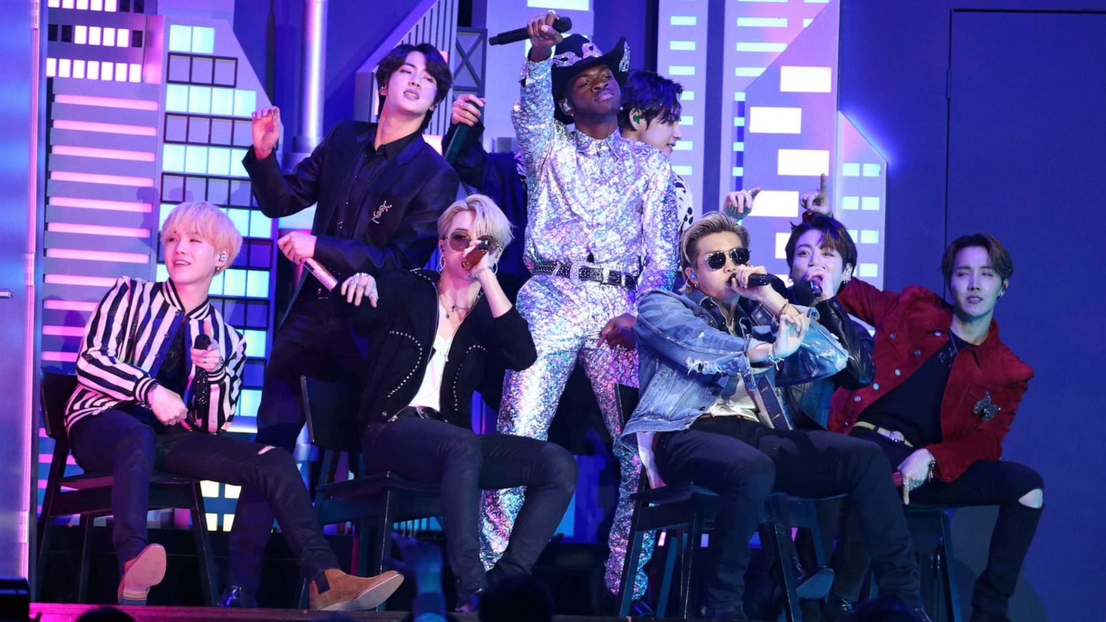 PHOTO: Lil Nas X, background center, and members of BTS perform "Old Town Road" at the 62nd annual Grammy Awards on Sunday, Jan. 26, 2020, in Los Angeles.